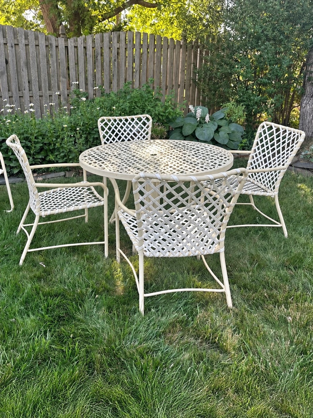 White patio furniture with vinyl straps